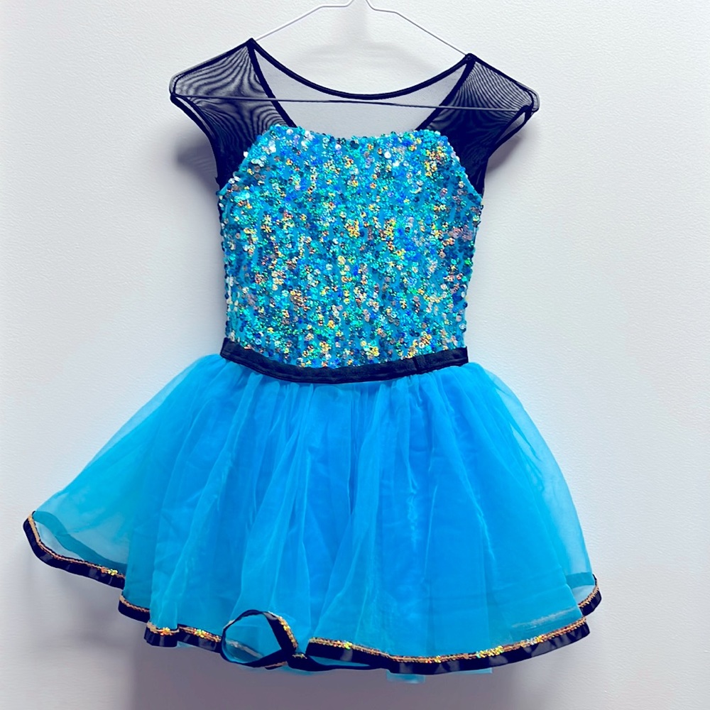 Turquoise, black, and gold tap costume